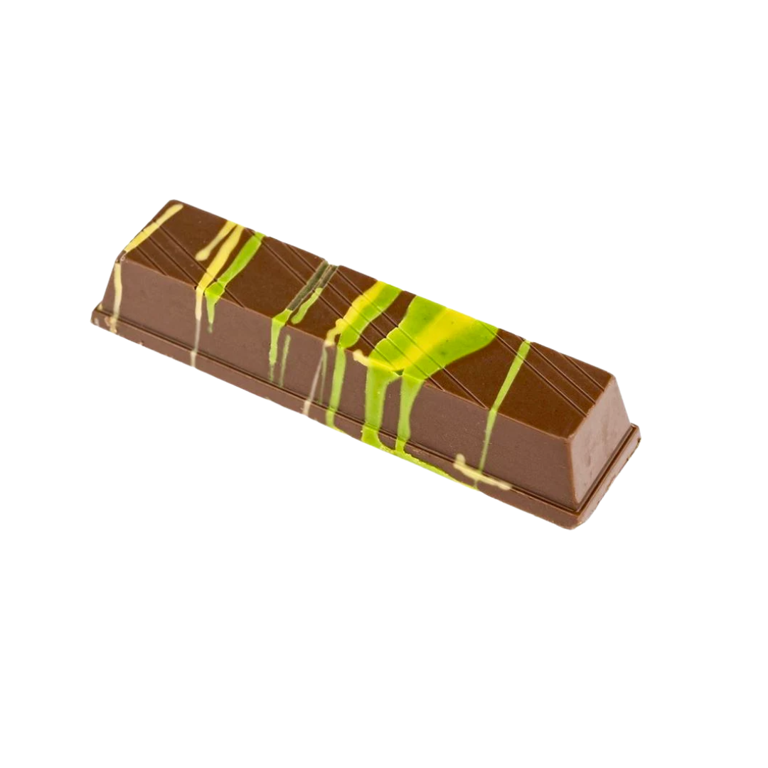 Chocolate bar with green and white drizzle on a white background