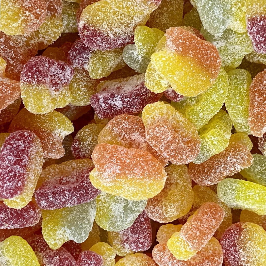 Close-up of colorful gummy bears with a sugary texture.