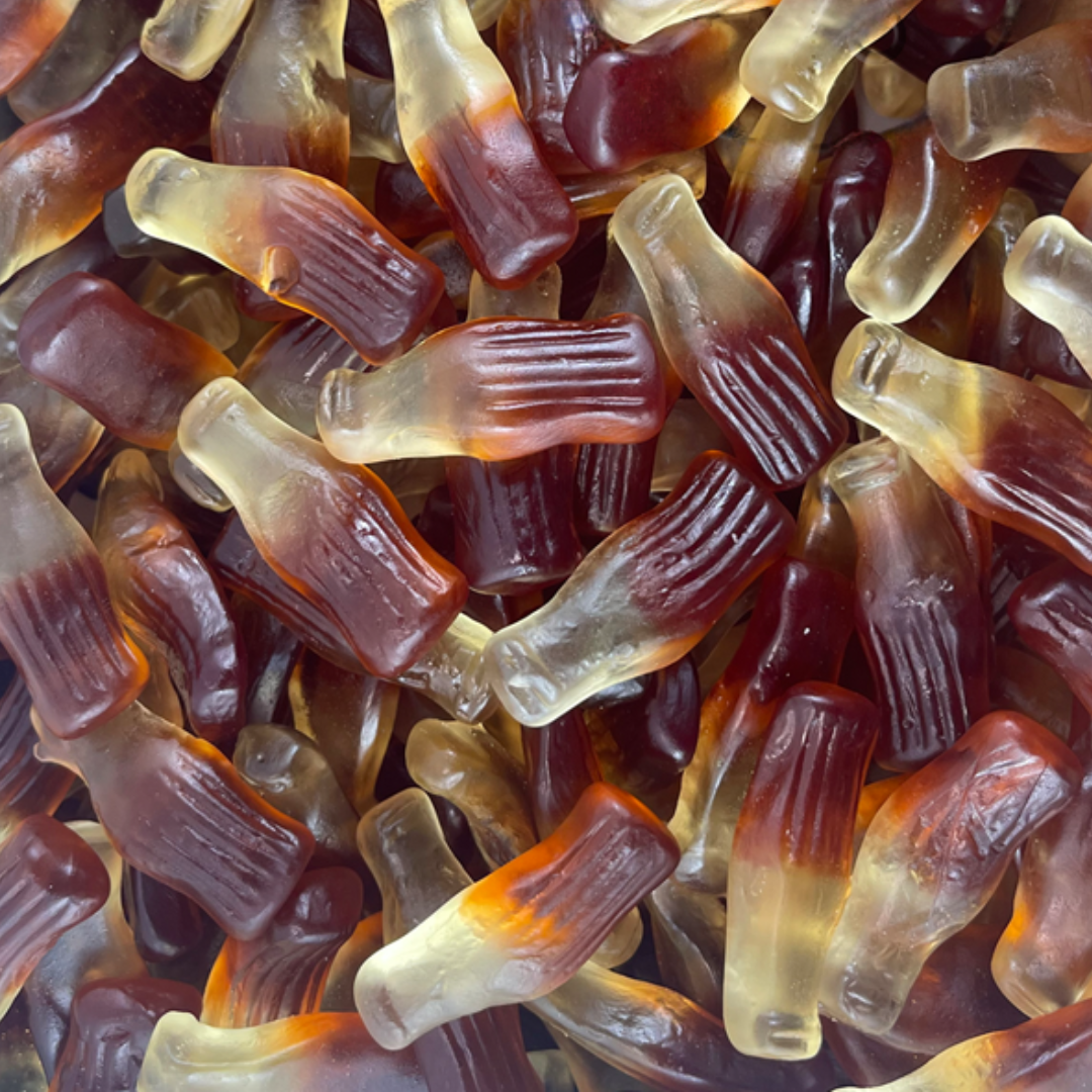 Close-up of red and yellow gummy worms.