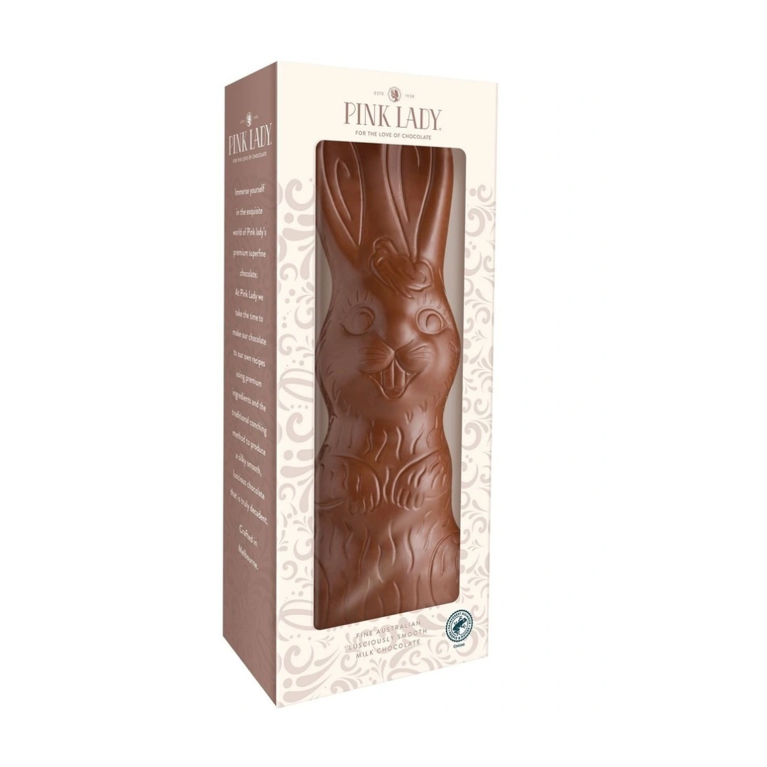 Chocolate bunny in a decorative box with 'Pink Lady' branding on a white background