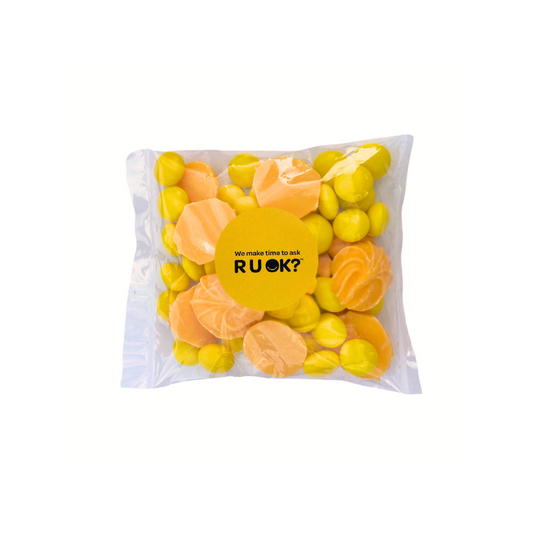 Packaged chocolates with a r u ok? day brand logo on a white background