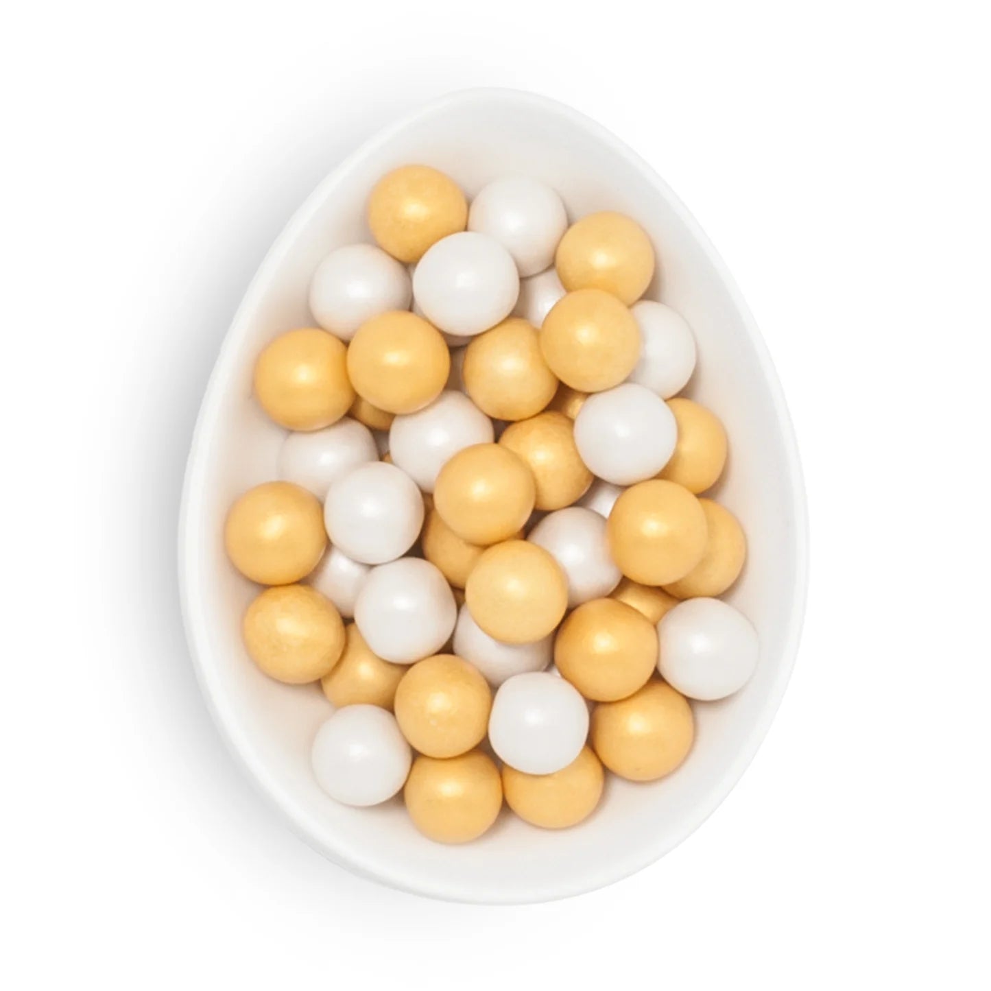 White bowl filled with yellow and white round beads on a white background