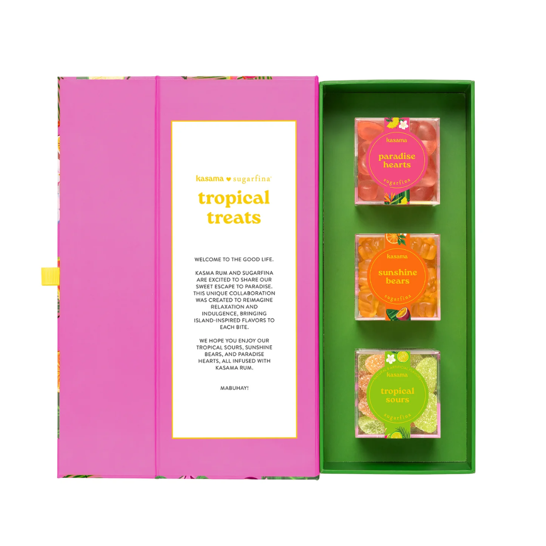 Box of tropical treats with colorful packaging on a white background