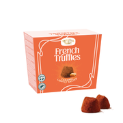 Box of French truffles with two truffles on a white background